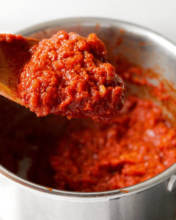 finished sauce on spoon