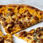 Pumpkin, Sausage, and Sage pizza, sliced