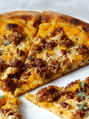 Pumpkin, Sausage, and Sage pizza, sliced