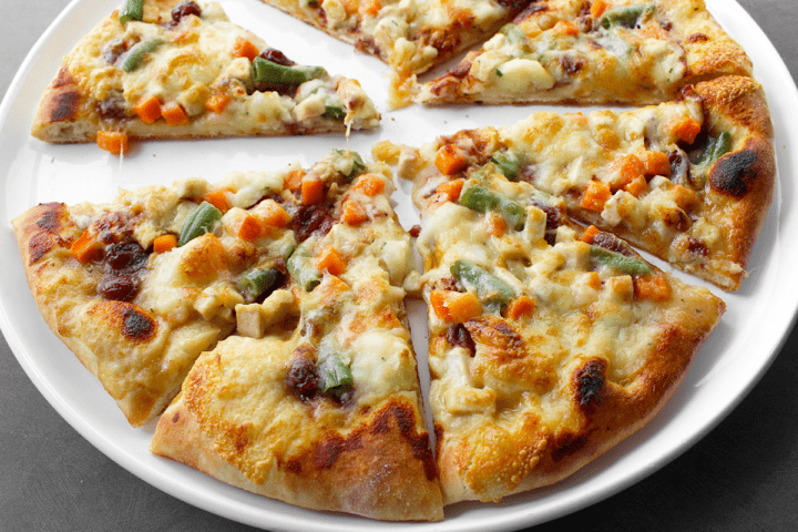 leftovers pizza on platter