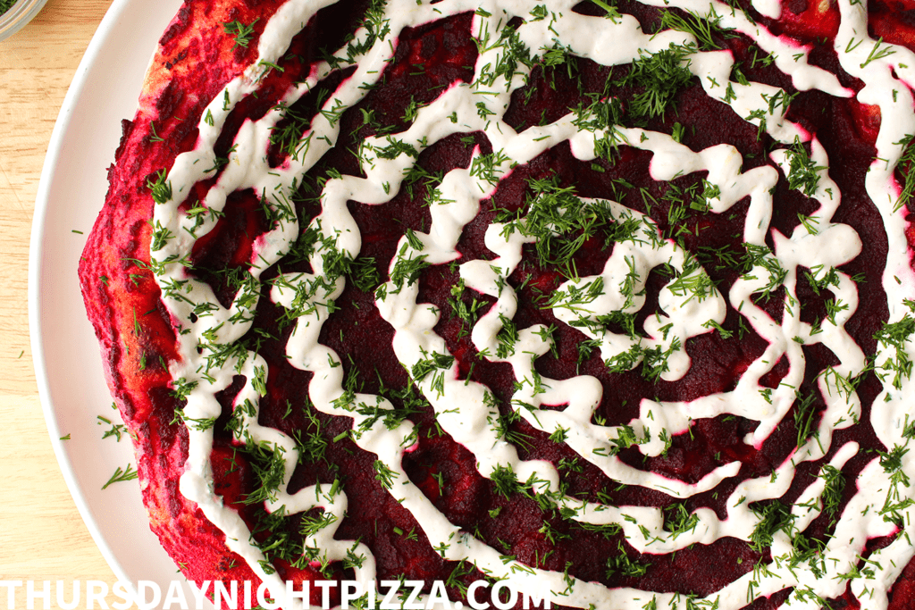 Borscht Pizza with beet puree, horseradish cream, and fresh dill