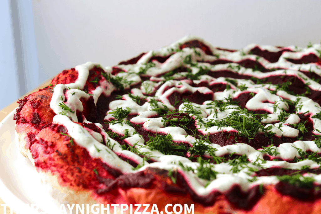 Borscht Pizza with beet puree, horseradish cream, and fresh dill