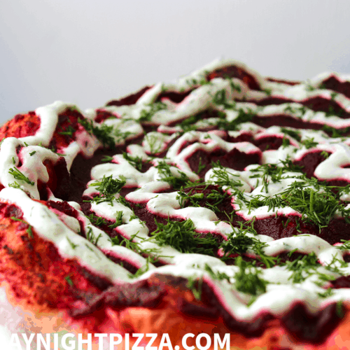 Borscht Pizza with beet puree, horseradish cream, and fresh dill