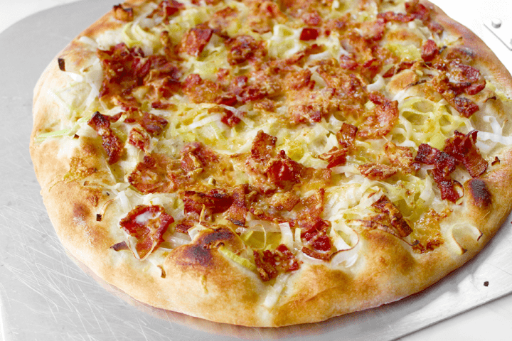 white pizza with bacon hot out of the oven