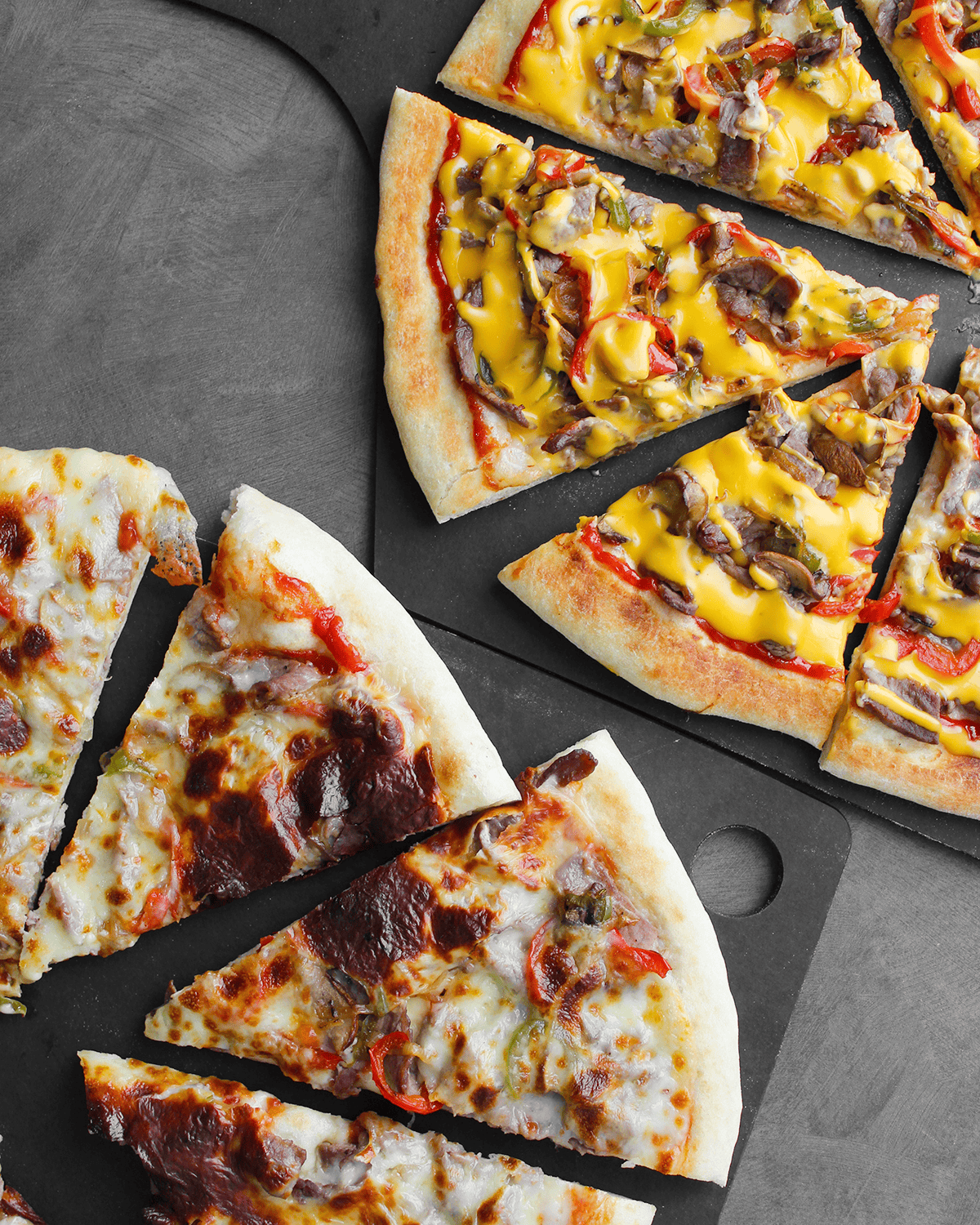 cheese steak pizzas two ways: Cheez Whiz and sliced provolone and American cheese