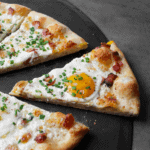 Bacon Egg and Cheese Pizza slice