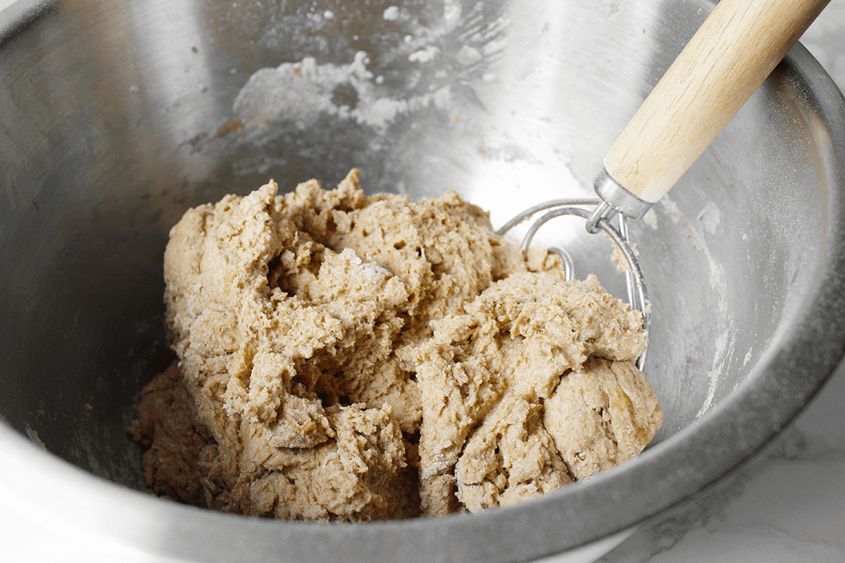 mixing dough in bowl