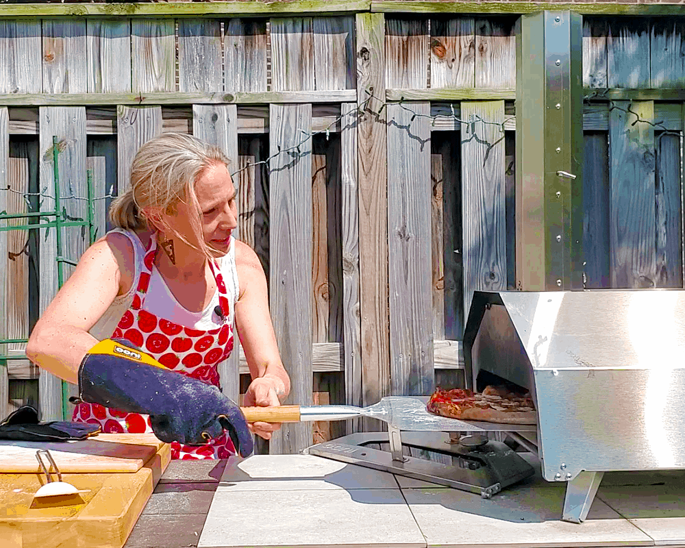 Taking the Baked Pizza off the Baking Stone or Baking Steel