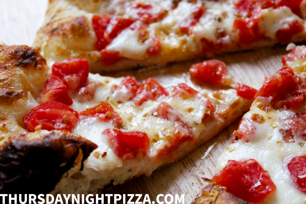 White Pizza with Roasted Garlic and Diced Tomatoes