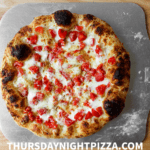 White Pizza with Roasted Garlic and Diced Tomatoes