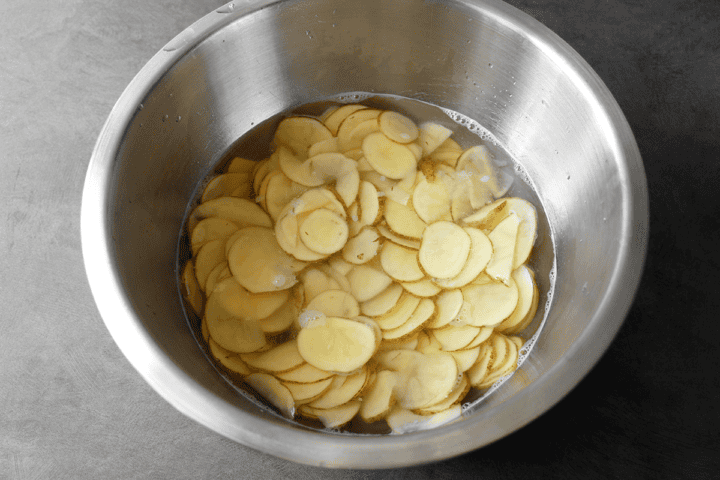 potatoes soaking in water for pizza