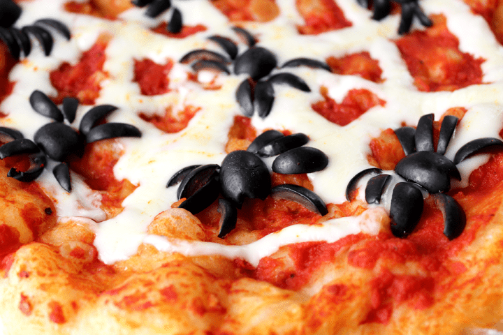 Thursday Night Pizza's creepy spider olives on Halloween pizza