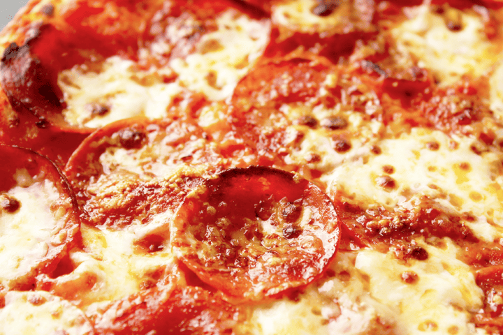 presliced boars head on baking stone pizza