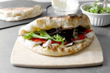 cured meat with mozzarella and tomato