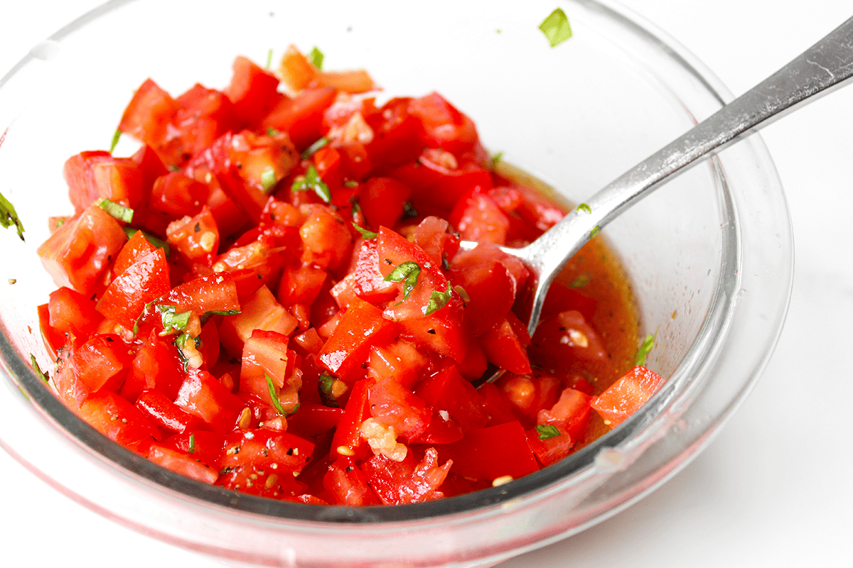 tomatoes marinating in bowl