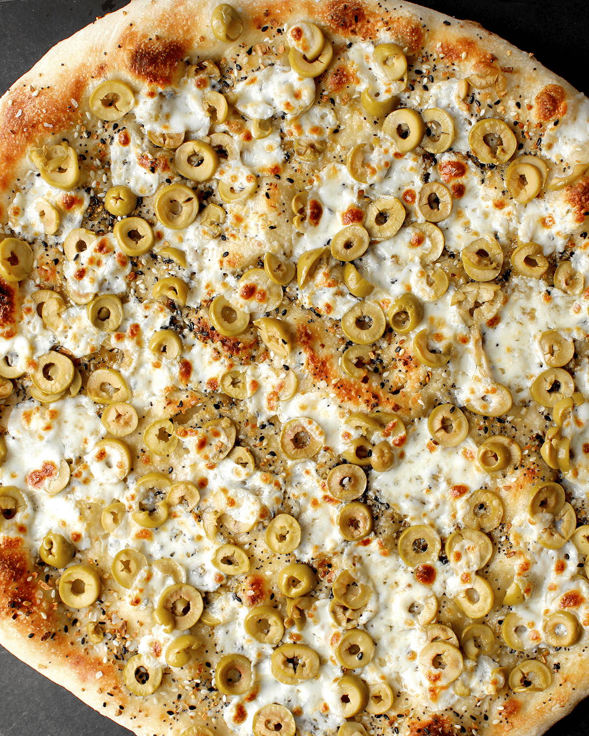 olive pizza with everything bagel seasoning