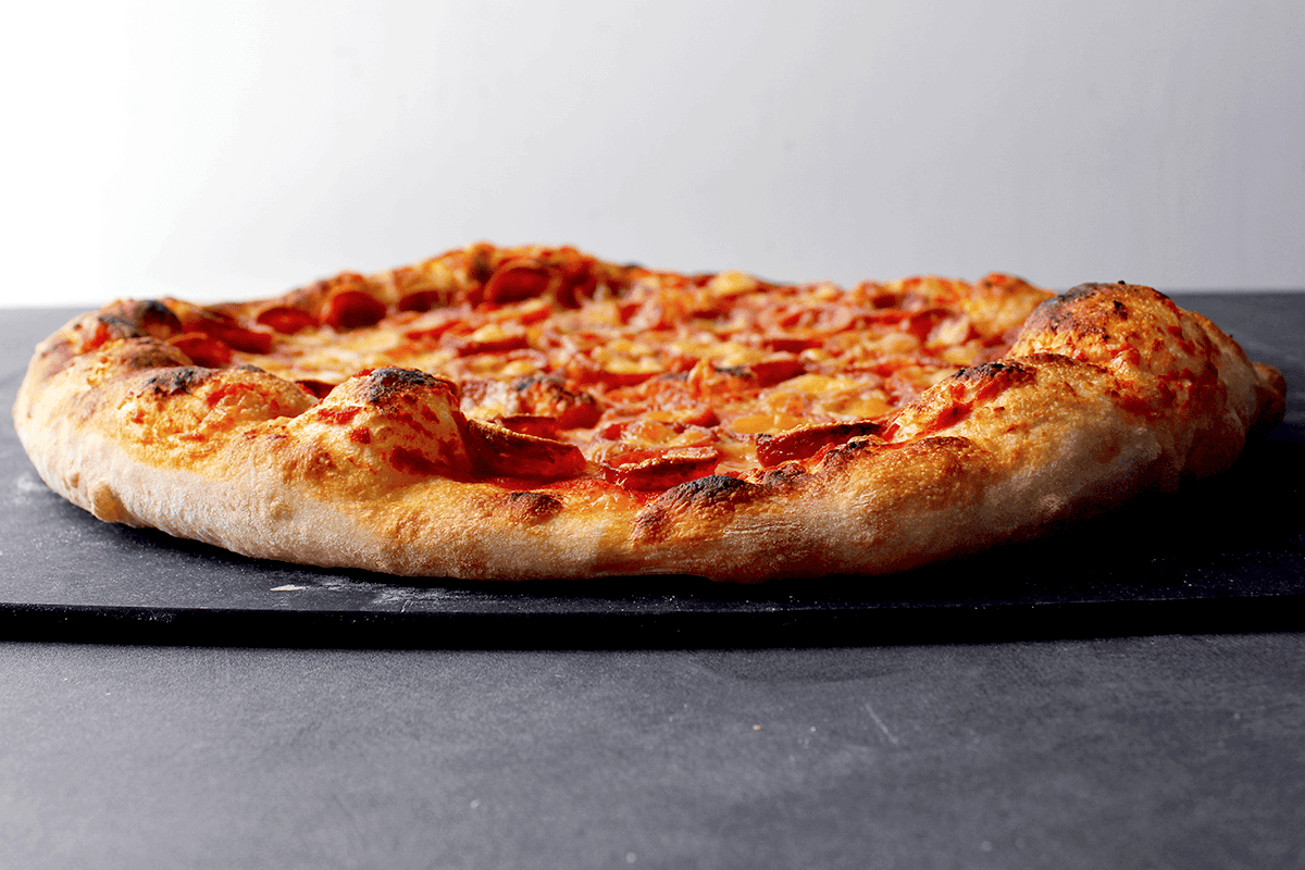 side view of baked pizza crust